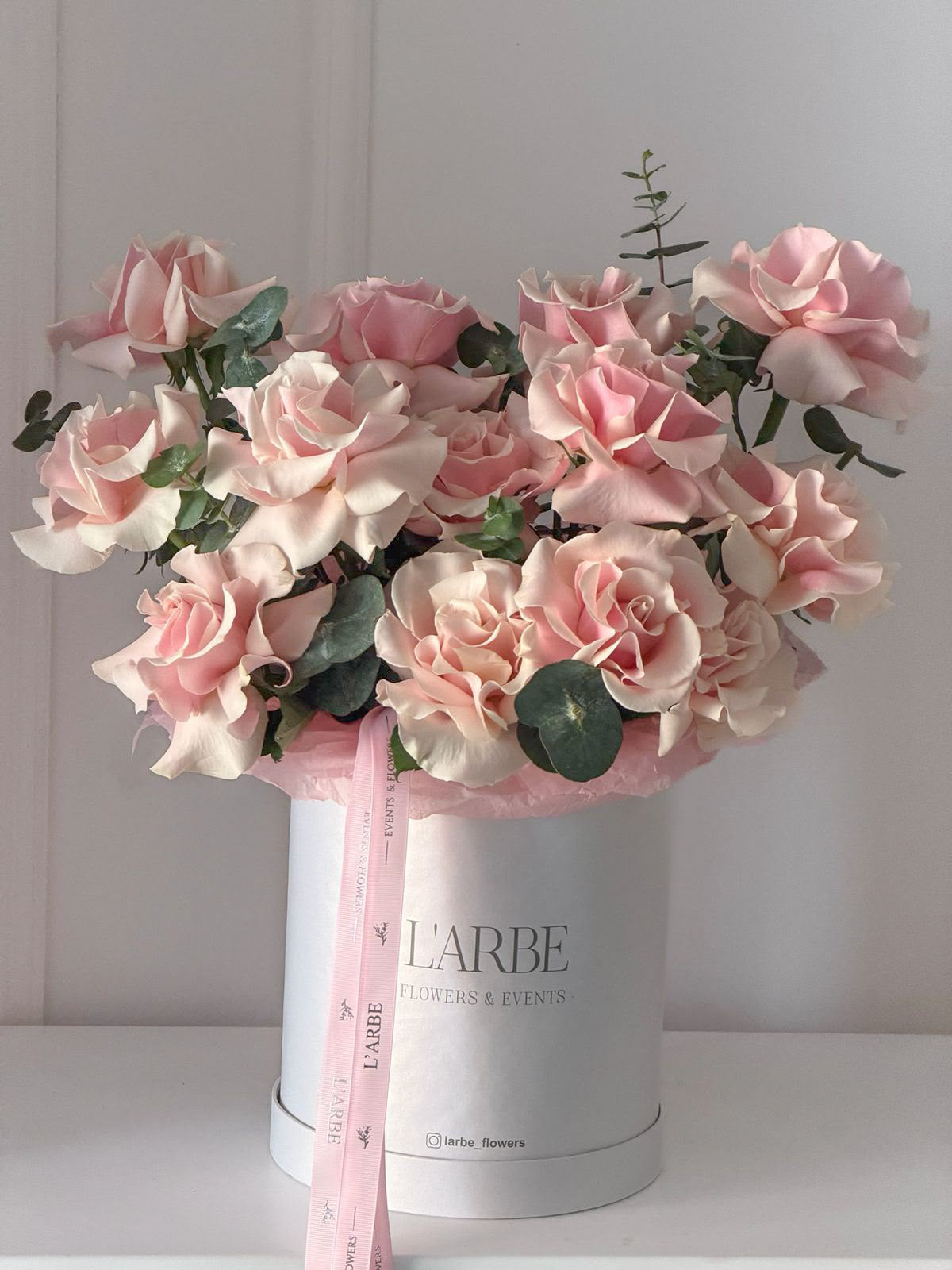 ROSES WITH EUCALYPTUS IN BOX