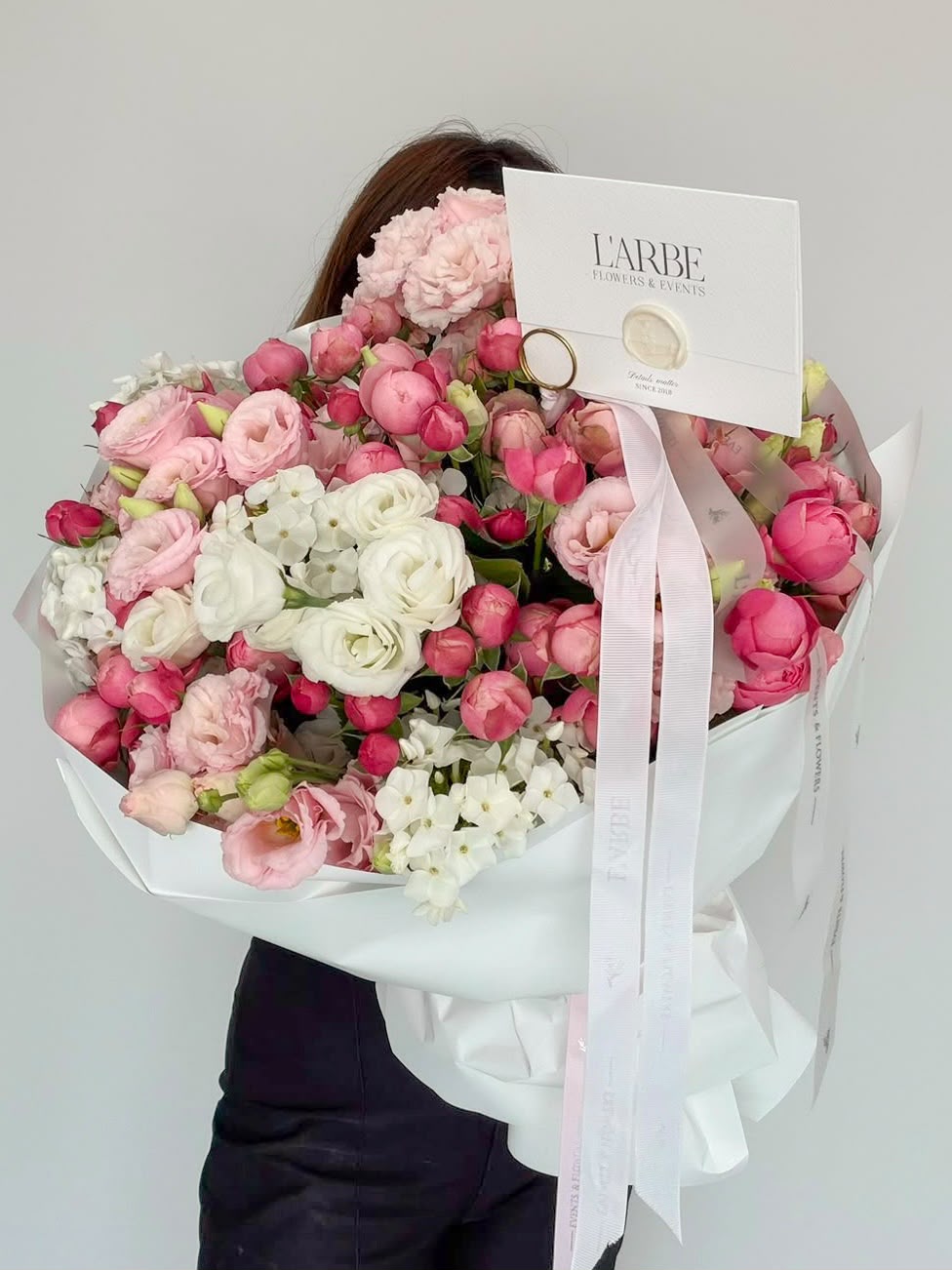 PINK FLOWERS MIX WITH ROSES AND EUSTOMA