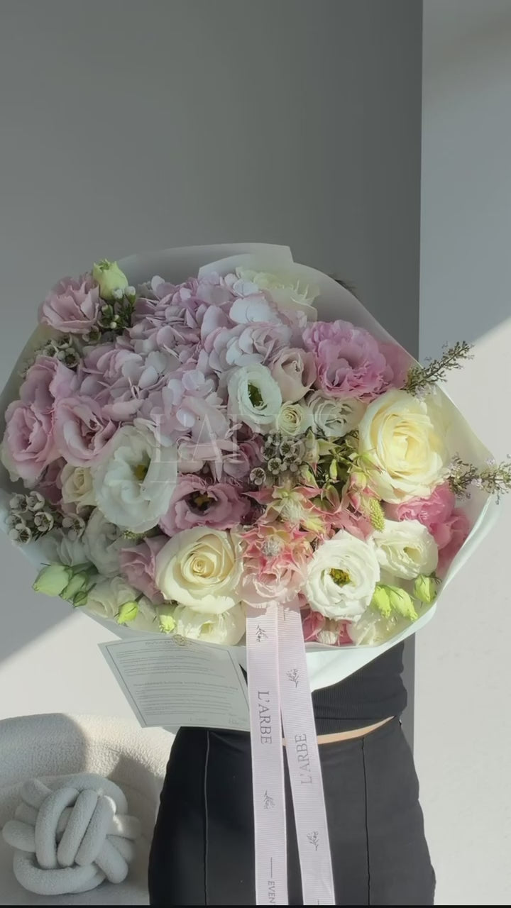FLOWERS BOUQUET WITH ROSES AND EUSTOMA “CAPTIVATE”